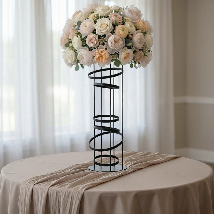 2pcs/set Modern Black Spiral Table Centerpiece on top of blush/rose gold tablecloth and faux florals on top of the centerpiece