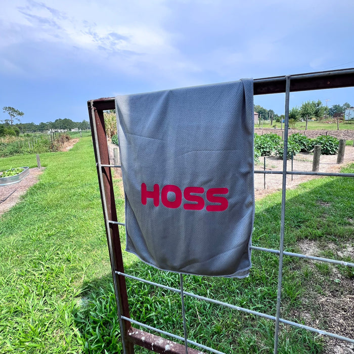 Hoss Cooling Towel hanging on garden gate