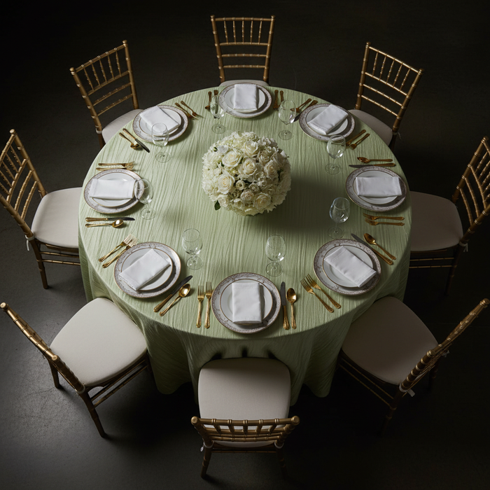 Accordion Crinkle Taffeta 132" Round Tablecloth - Sage Green | charger plate | napkin | wine goblets | centerpiece |