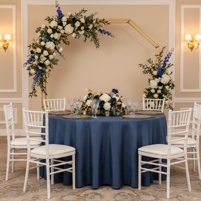 Crushed Taffeta 132" Round Tablecloth - Navy Blue for indoor reception with gold trimmed charger plate | wine goblets | flower centerpiece