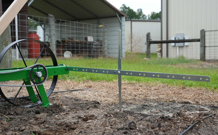 Row Maker attached to the Garden Seeder at the beginning of a row.
