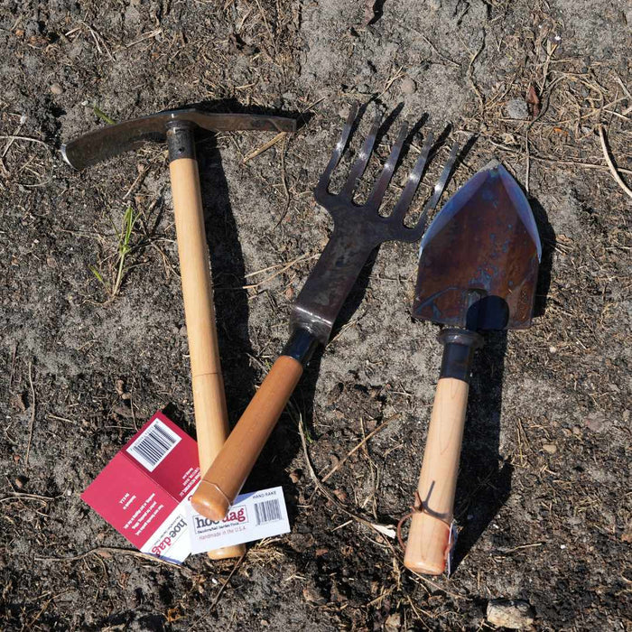 Hoe Dag Tool Kit laying in the dirt