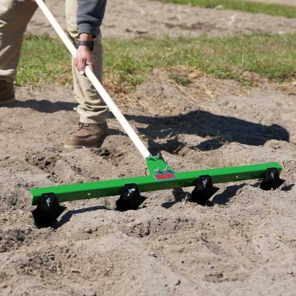 Row maker hand tool being used