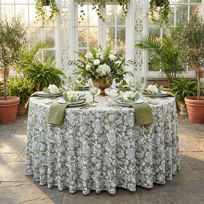 Vintage Lace Print Scuba Round Tablecloth Olive Green/White with olive green napkin, goblets and floral centerpieces