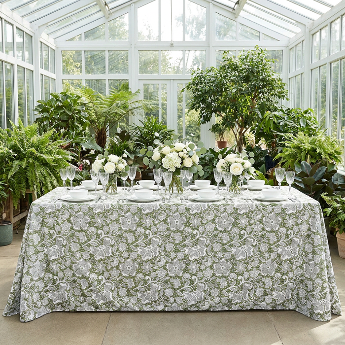 Vintage Lace Print Scuba Rectangular Tablecloth Olive Green/White paired with white dinnerware, wine goblets and white floral centerpieces